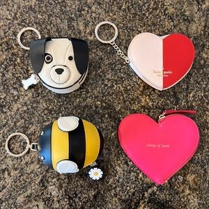 Four Kate spade novelty change purses never used. Would like to sell as a group.